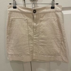 Off-white corduroy mini skirt